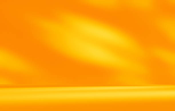 istock Empty orange golden yellow room for displaying the products. 2242052430