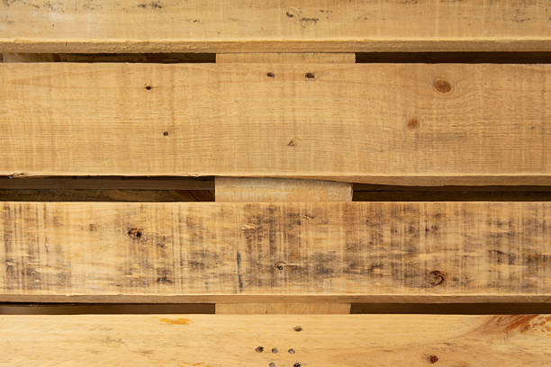 A pallet of planks awaits delivery.