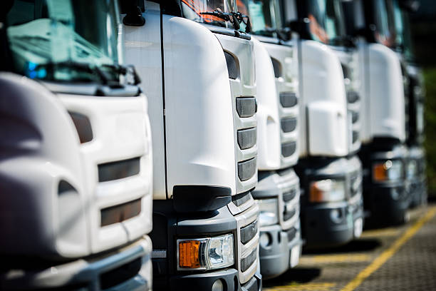 istock Trucks Lined up in a Storage Yard During Daytime 2242058930