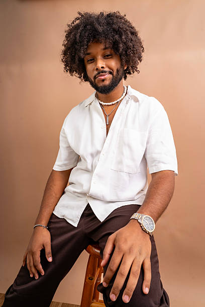 istock Young adult black man posing with confidence 2242059598