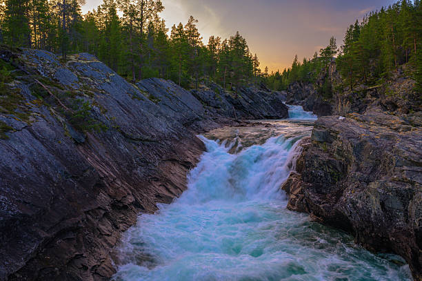 istock Pollfoss Waterfall on the Framruste Rive at Sunset near Billingdalen, Norway 2242062777