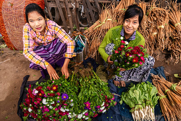 istock Burmese women selling flowers, Myanmar 2242068728