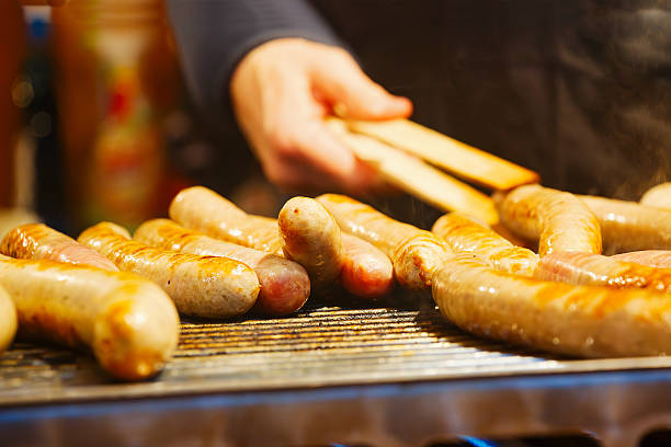 istock Delicious Bratwurst Sausage On Gas Grill 2242074000