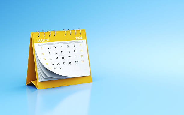 istock March 2026 Yellow Realistic Desk Calendar on Blue Endless Background 2242077666