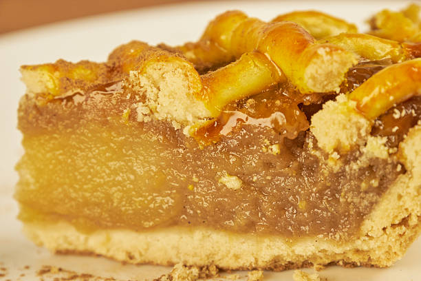 Apple pie, crispy pastry close-up on a white background