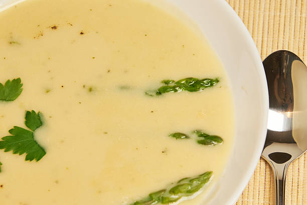 istock Fresh green asparagus soup on a table with copy space 2242080572