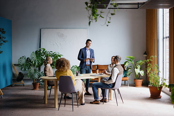 istock Business team having an informal meeting presentation 2242083775