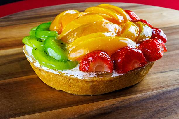 Fruit Cake with strawberries, peaches and kiwi