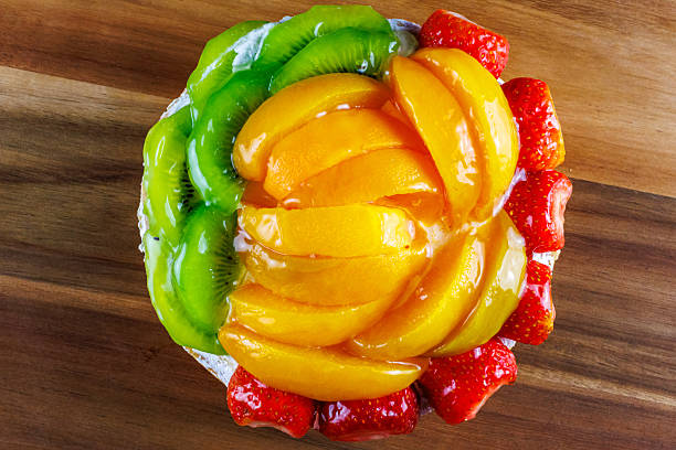 Fruit Cake with strawberries, peaches and kiwi