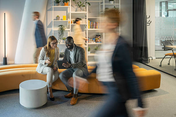 Business colleagues sharing ideas in a modern office space