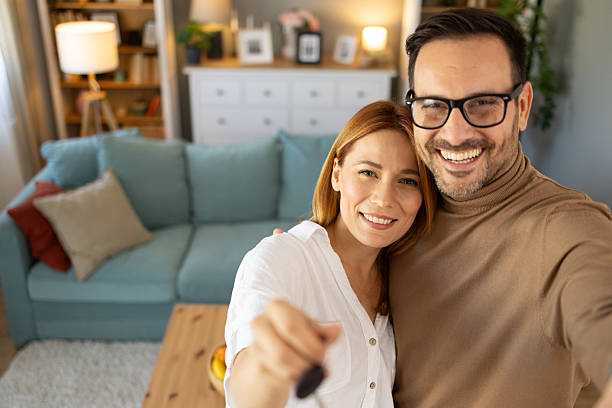 istock Couple enjoying their new home with vibrant joyfulness 2242090291