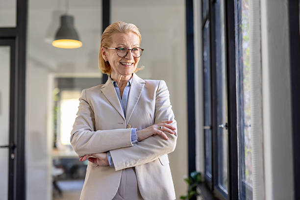 istock Cheerful Professional Woman Using Tablet in Office 2242090304
