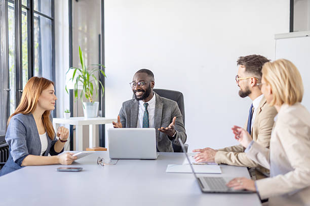 istock Engaging Team Meeting with Productive Conversations and Smiles 2242090311