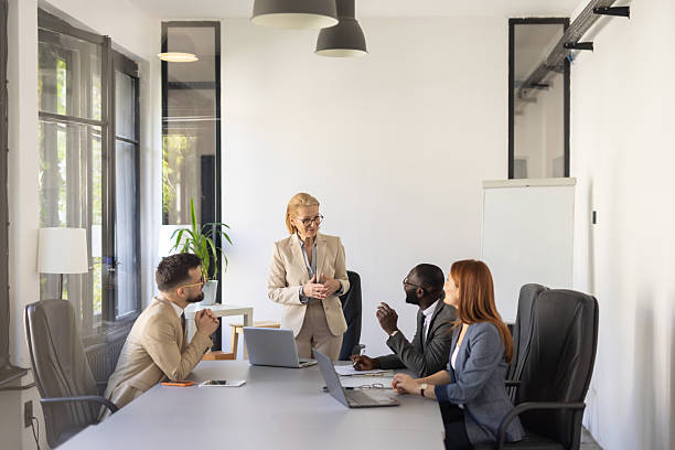 istock Professional Team Meeting in a Modern Office Space 2242090321