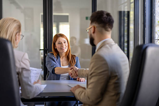 istock Handshake Between Job Interviewer and Candidate in Office 2242090336