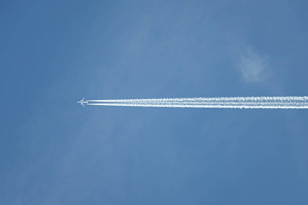 istock Aircraft with Chemtrail 2242090348