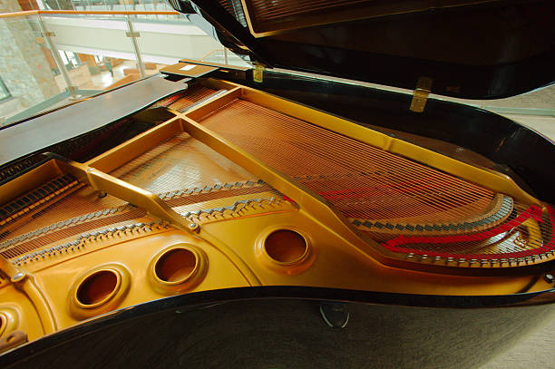 istock Golden Grand Piano Interior With Open Lid And Strings In Modern Setting 2242094380