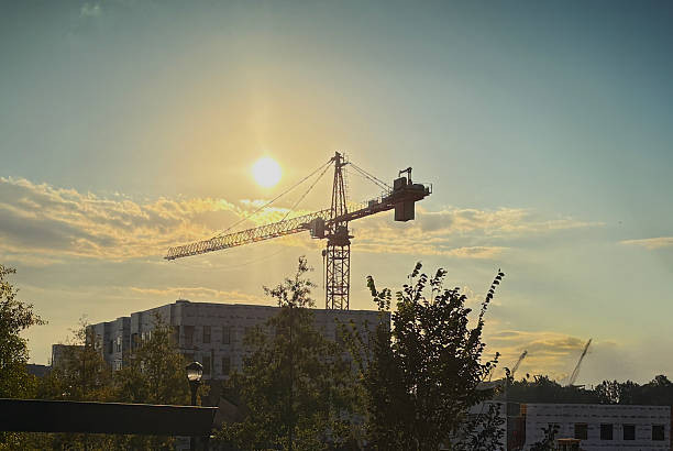 istock Tower Crane over Apartment Building Under Construction 2242095336