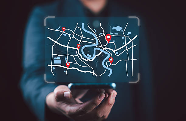 istock Businessman using smartphone searching world map with location point, GPS app, Destination travel maps and find places in the online system, searching by satellite system. 2242095672