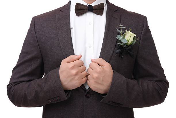 istock Groom with boutonniere on white background, closeup. Wedding accessory 2242095758