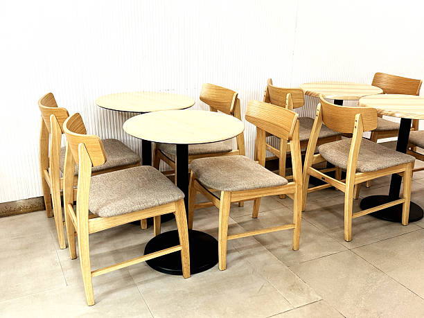 istock Wooden chairs and tables in a cafe. 3d rendering. 2242096351