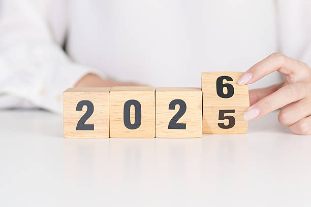 istock 2025 change to 2026 year block on table. goal, Resolution, strategy, plan, start, budget, mission, action, motivation and New Year concepts 2242105137