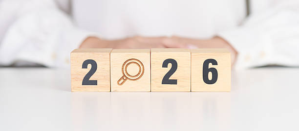istock 2026 year block with magnifying glass icon. SEO, Search Engine Optimization, hiring , Advertising, Idea, Strategy, marketing, Keyword, Content and New Year start concepts 2242105176