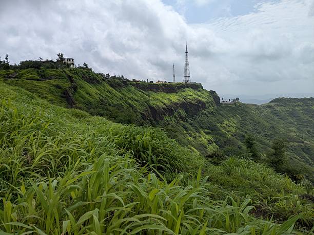 istock Expansive Valley Panorama from Mountain Overlook under Cloudy Sky 2242111391