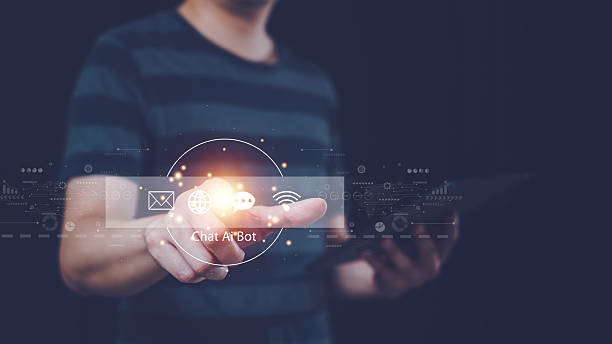 istock Chat Ai bot. Businessman using smart tablet and touching on virtual screen contact icons 2242112196