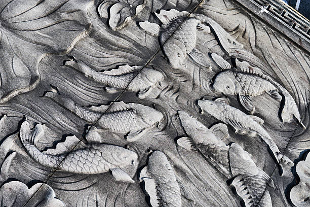 istock Chinese Traditional Culture Stone Carved Fish 2242115409