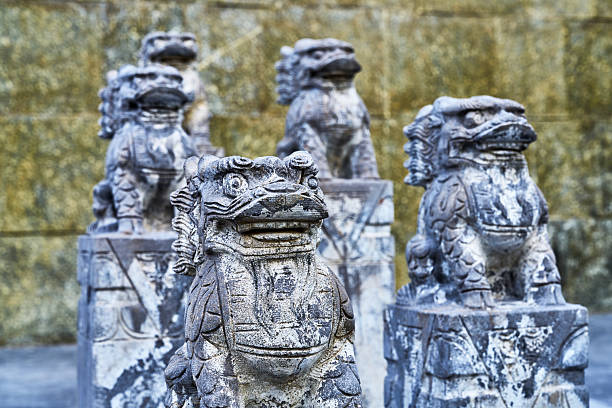 istock Traditional Chinese carved stone lions. 2242115673