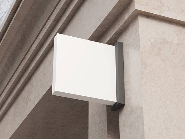 istock Minimal blank store sign mockup mounted on luxury shopping building wall 2242122784