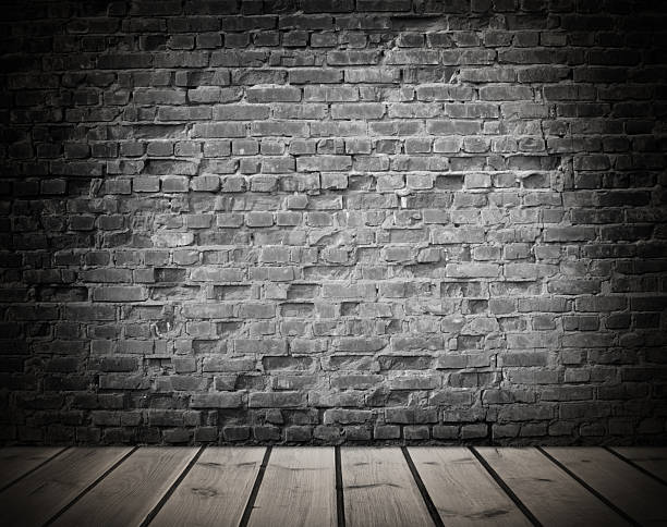 istock interior with an old brick wall and wooden floor 2242124570