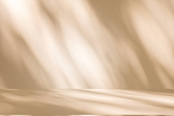 istock Studio style background wall decoration presentation uses white and beige tones. with shadows cast from a nearby window, concept creating a decorative 2242129604