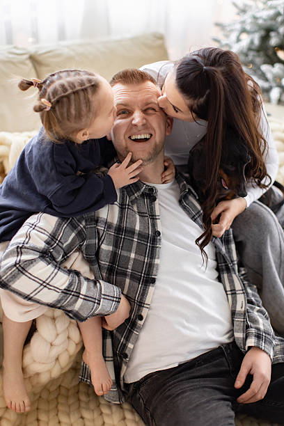 istock Family Joy: Kisses and Laughter 2242132204