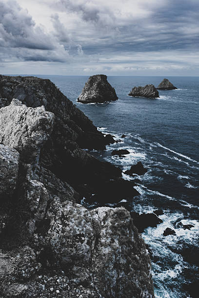 Pointe de Pen Hir in the Brittany region of France. In cold metallic blue.