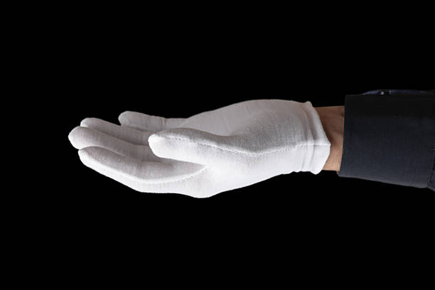 istock male hand gesture on black background wearing a white glove 2242142131