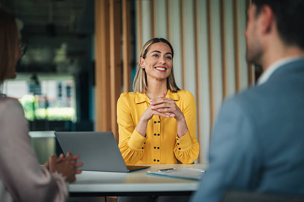 istock Advisors meeting with clients. Customer consultation in modern workplace 2242142559