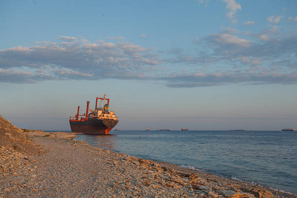 Landscape with sea, blue sky with clouds and ship