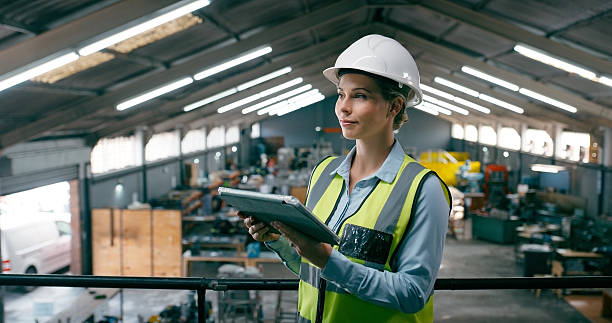 istock Engineer, thinking and woman on tablet for inspection, quality control and maintenance in factory. Warehouse, industrial and person on digital tech for checklist, safety compliance and manufacturing 2242145292