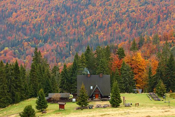 Mountain chalet on Hala Rycerzowa in Beskidy mountains in Poland. Autumn colors.