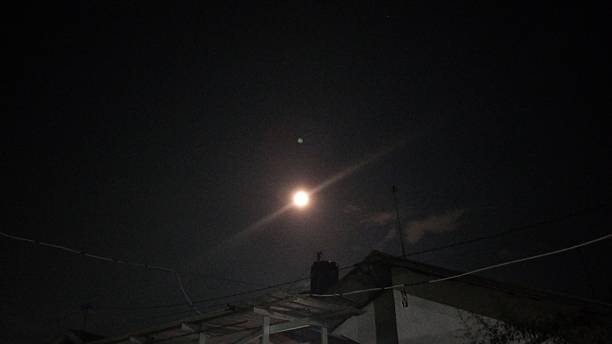 istock Full moon in the dark night 2242153058