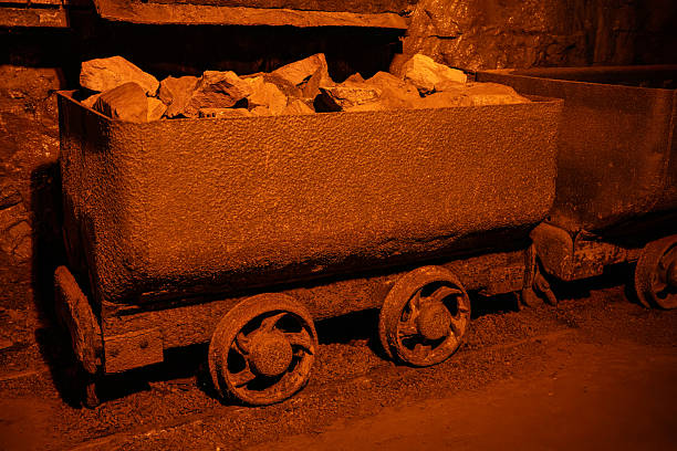 old  minecart  in underground mine and ore