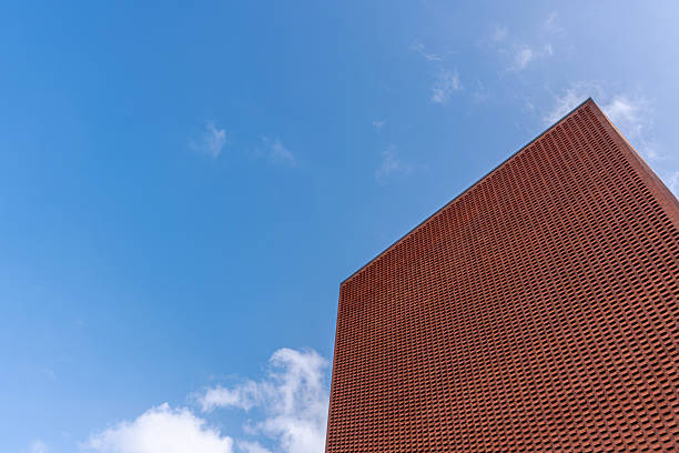 Texture and geometric patterns of red brick building parts