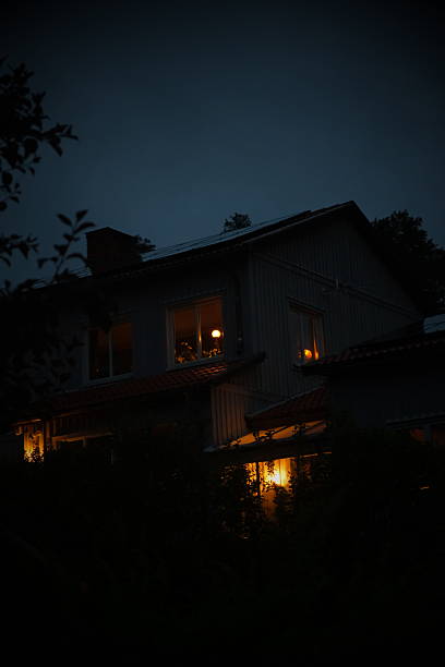 istock House villa by night, cozy lighting 2242155848