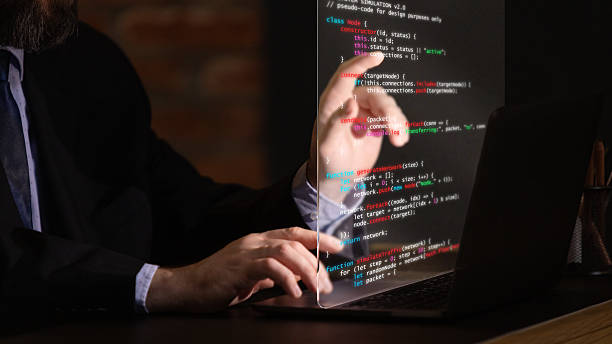 istock Trendy collage. Professional programmer working with transparent digital display in dark environment 2242158877