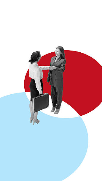 istock Graphic composition. Businesswomen shaking hands over colorful abstract circles representing agreement 2242162016