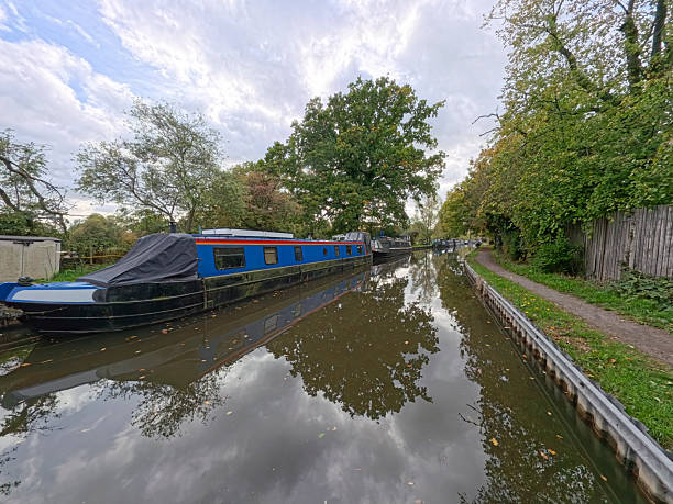 istock Narrowboats moored on a British canal in rural setting 2242162520
