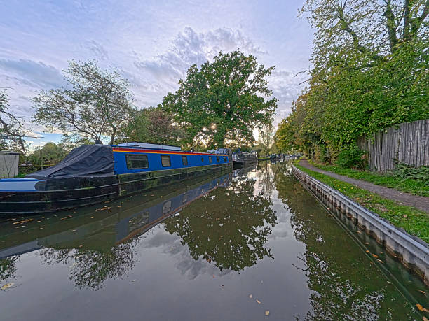 istock Narrowboats moored on a British canal in rural setting 2242162521