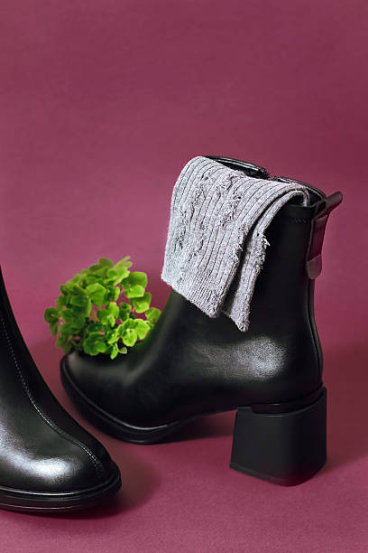 Women's high heel boots with socks isolated on background.